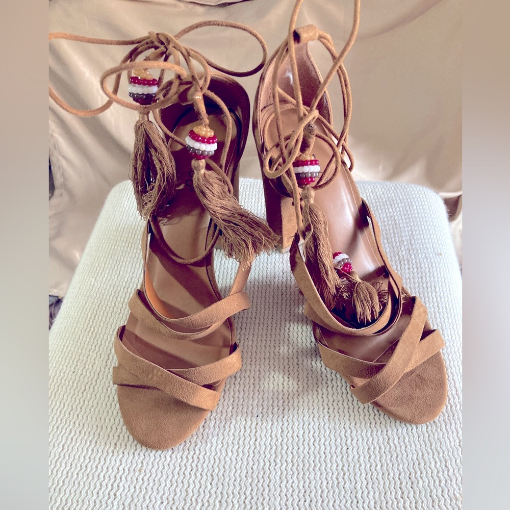 Dressy suede, criss cross straps, wide heel with string ups for legs, size 8